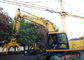 Carico di maneggio del materiale del residuo dei collegamenti di demolizione dell'escavatore di KOMATSU PC200 grande